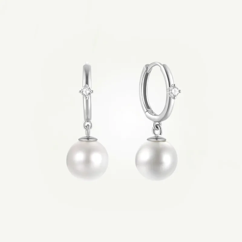 Kolczyki srebrne z perłą – elegancja i styl na co dzień Snobistiq